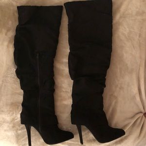 Over the knee black heeled boots